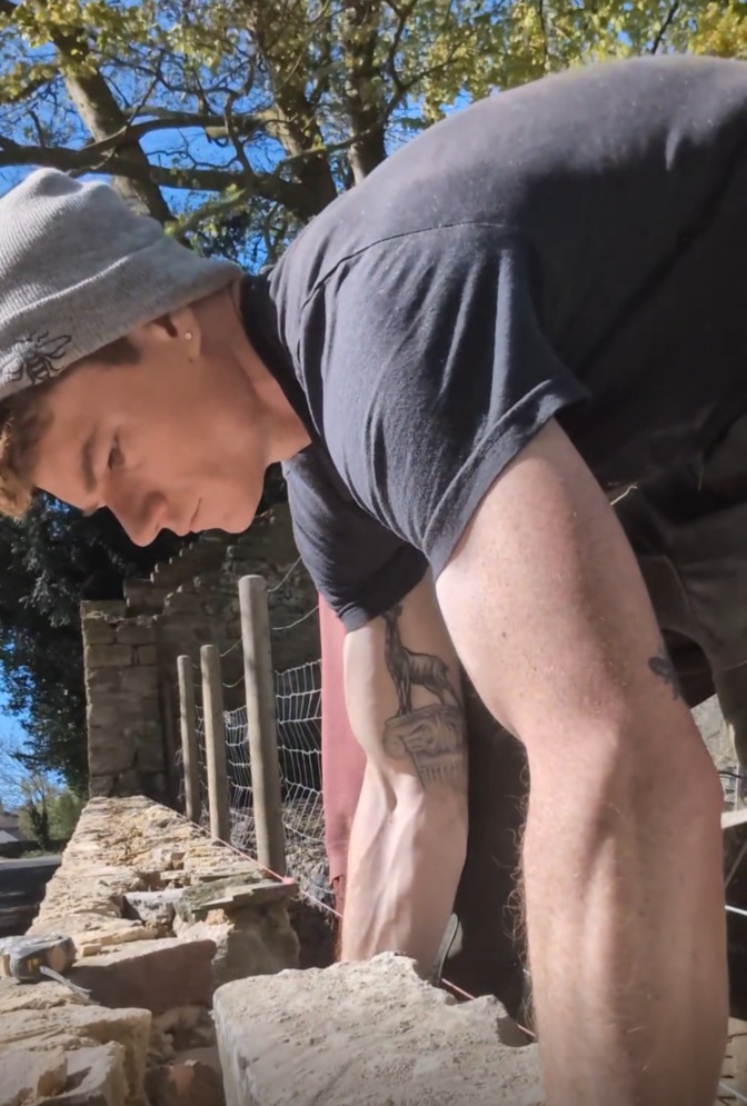 Stonemason working on historic stonework